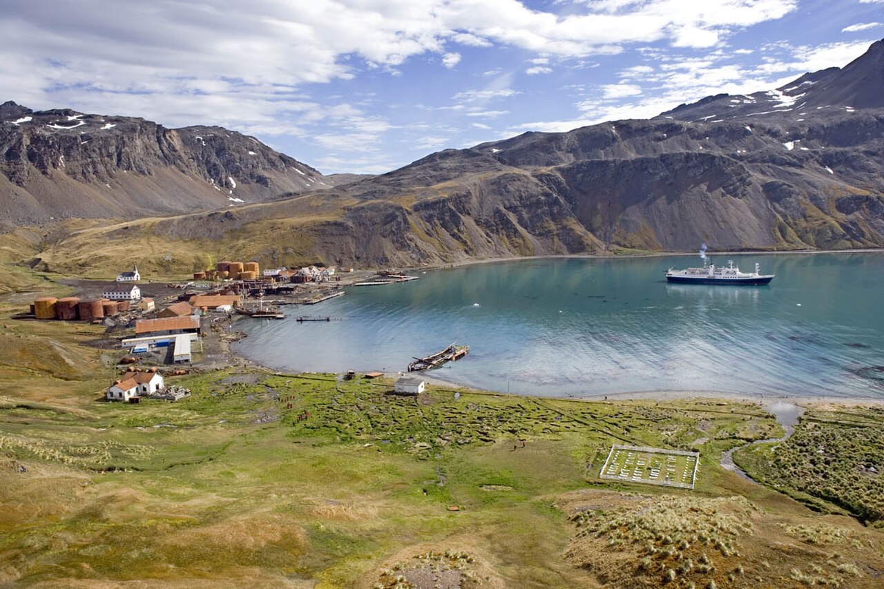 Grytviken whaling station, the whalers' cemetery, and an expedition ship at anchor, South Georgia